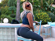 Cameron Canada posing near the pool